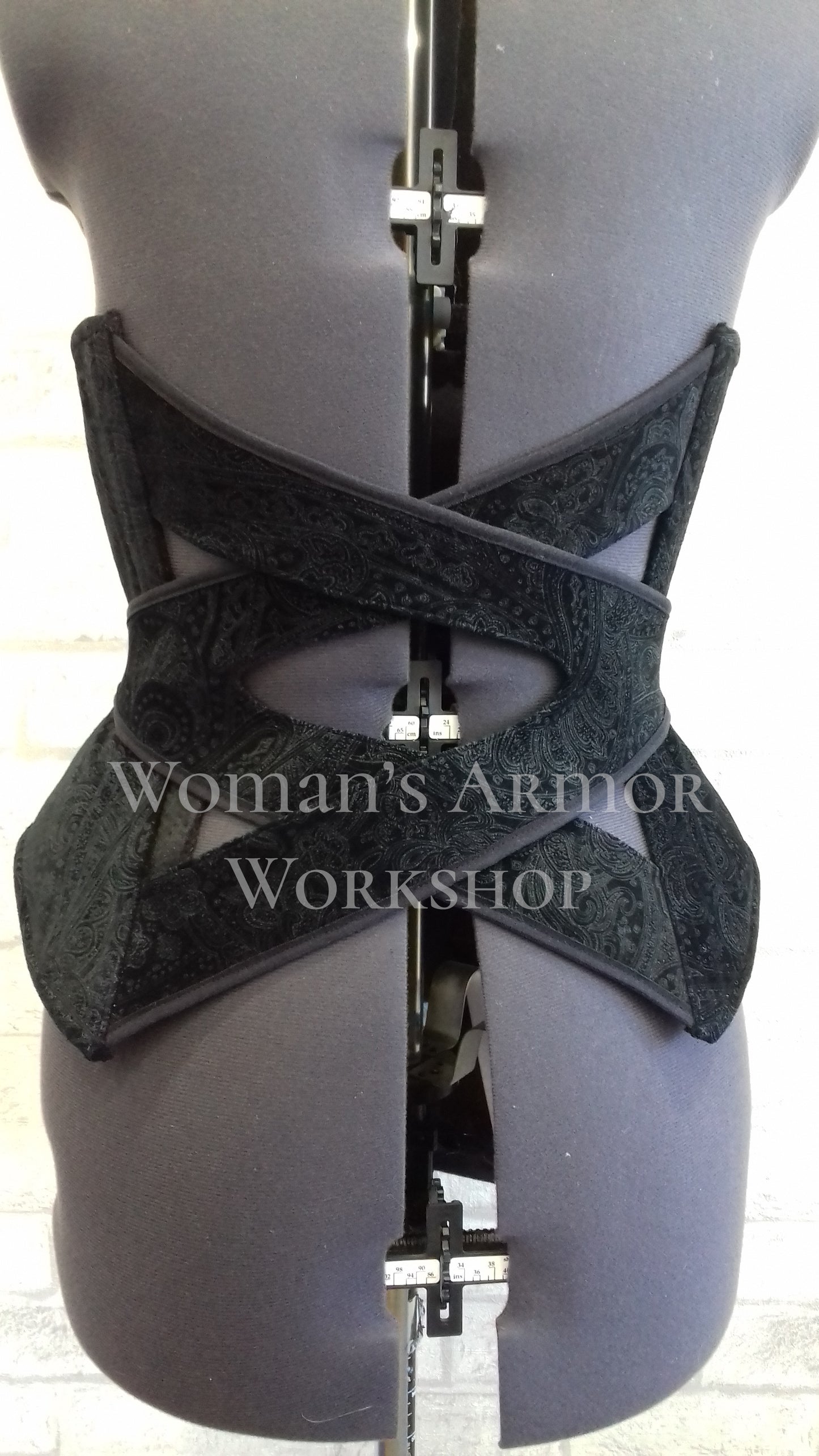 Cross-belted corset